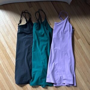 Stylish Trio of Dresses - Black, Green, and Purple